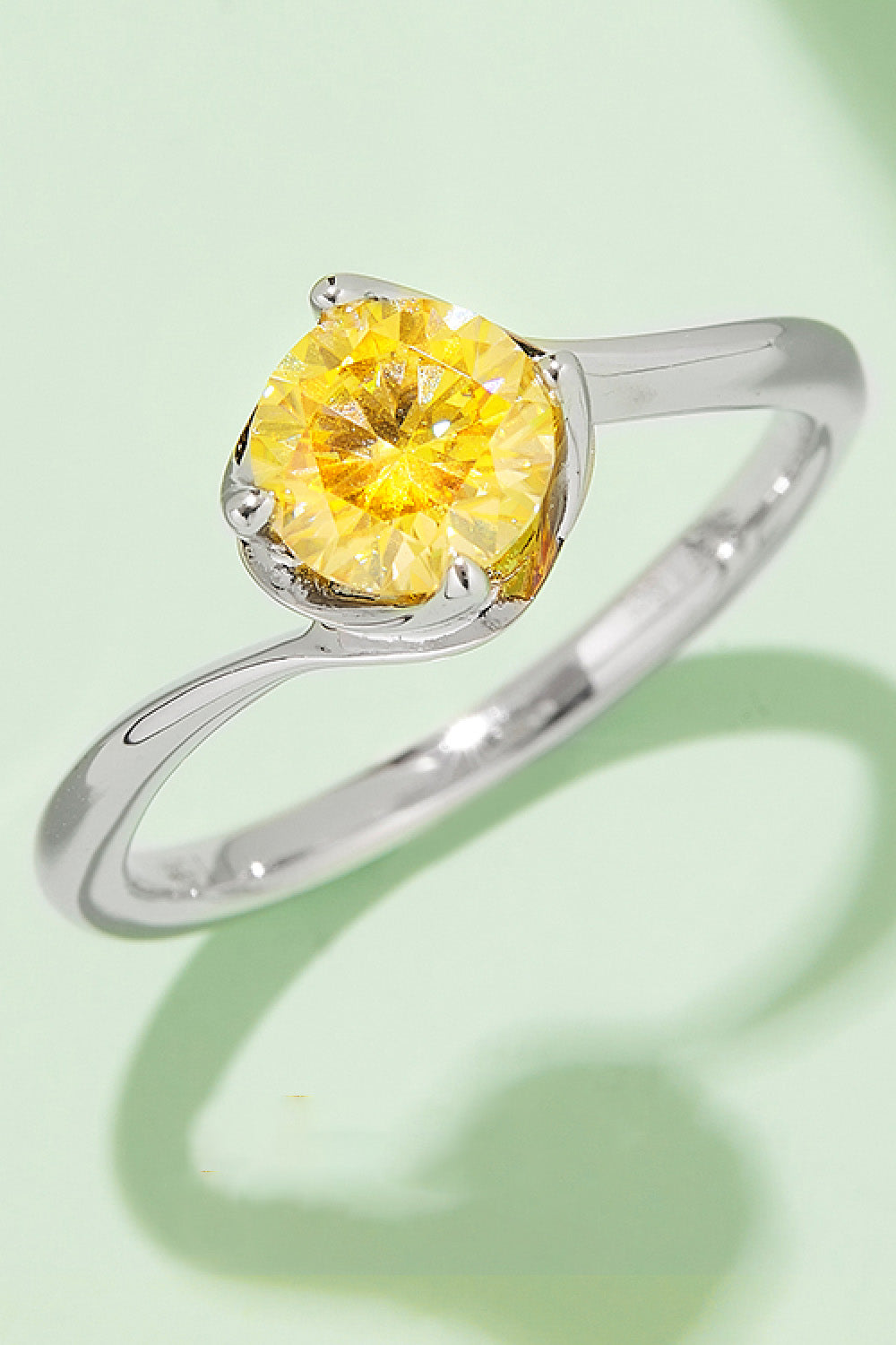 1 Carat Brilliant Round Cut Sparkala™ Platinum Over Pure Sterling Silver Solitaire Ring (Yellow, Pink, or Blue)