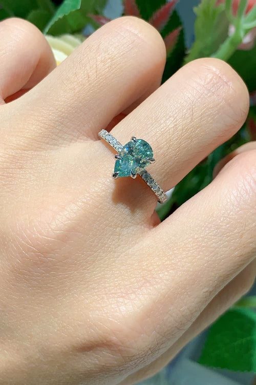 1.5 Carat Teardrop Shape Blue Pear-Cut Sparkala™ Platinum Over Pure Sterling Silver Ring