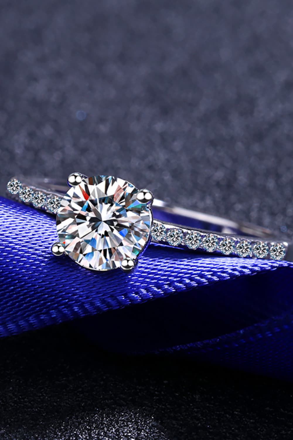 1 Carat Brilliant Round Cut Sparkala™ Rhodium-Plated Side Stone Ring