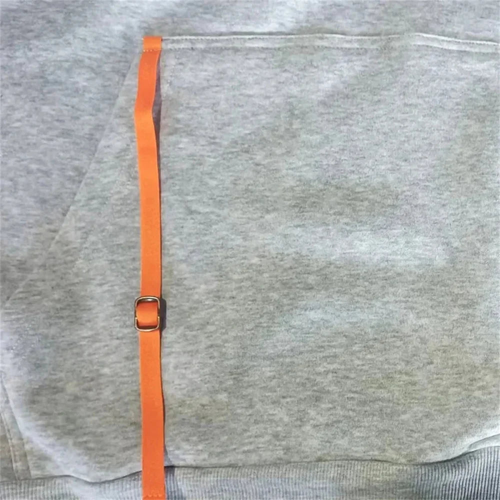 A two-piece outdoor fashion jogging and fitness set for men in autumn and winter, featuring a hooded sweatshirt and casual pants