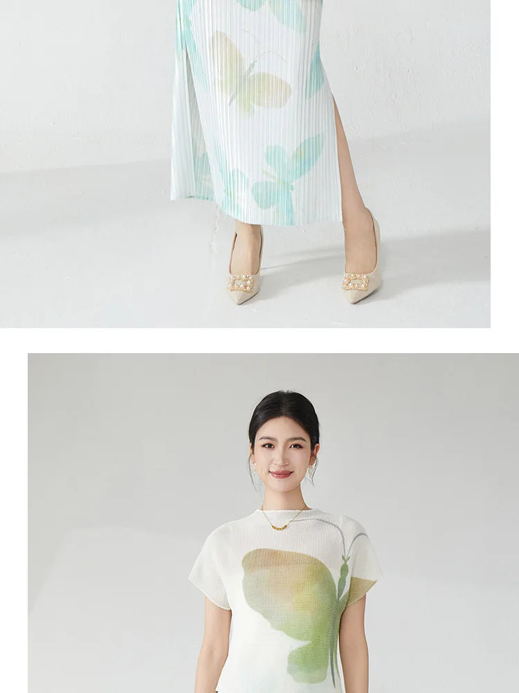 Summer women's outfit: a stylish two-piece set including a short-sleeved T-shirt and a pleated midi skirt with a slit.