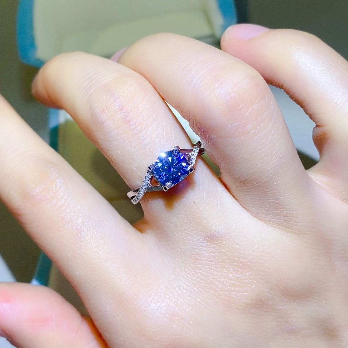 1 Carat Blue Brilliant Round Cut Sparkala™ Crisscross Pure Sterling Silver Ring