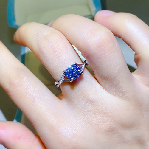 1 Carat Blue Brilliant Round Cut Sparkala™ Crisscross Pure Sterling Silver Ring