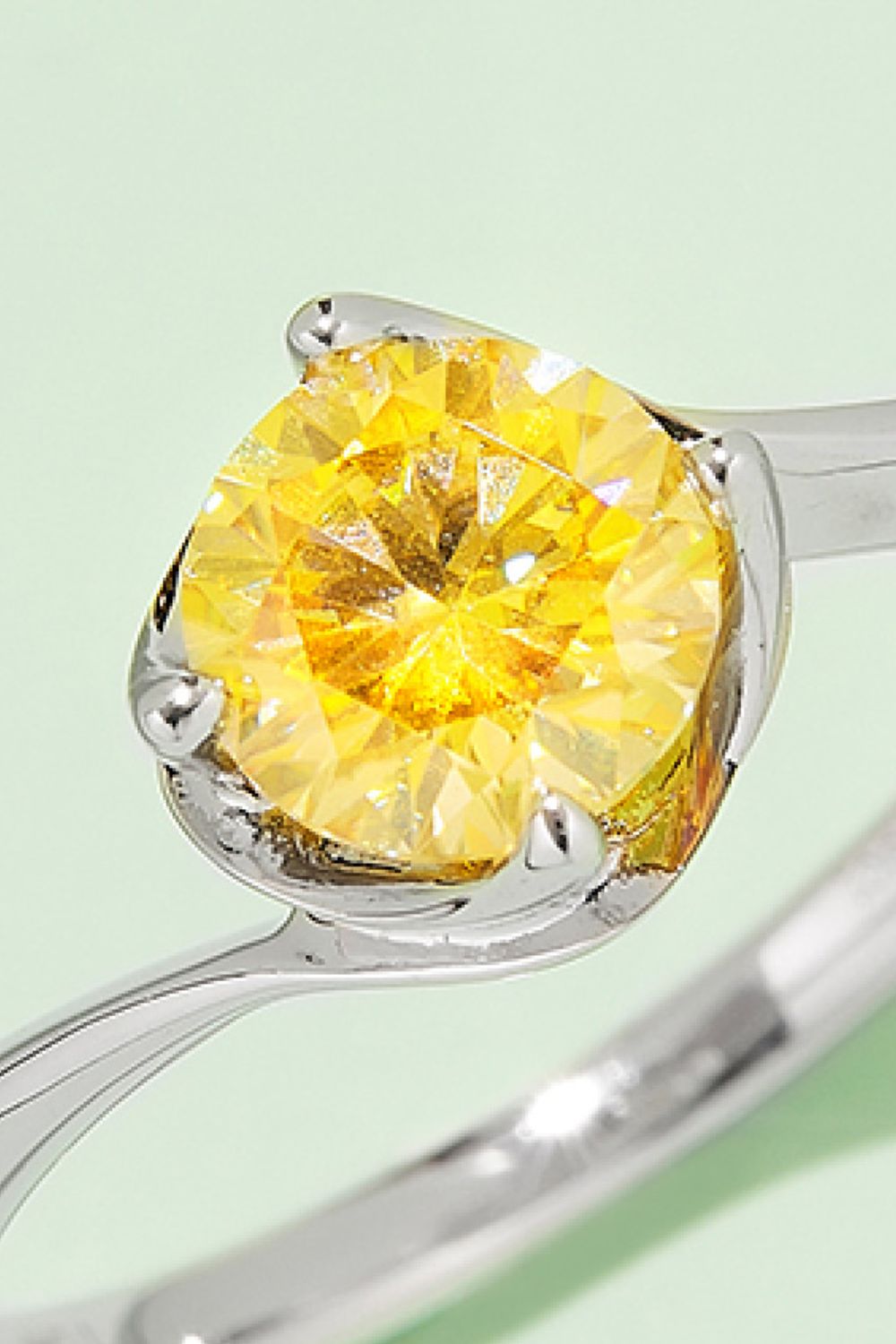1 Carat Brilliant Round Cut Sparkala™ Platinum Over Pure Sterling Silver Solitaire Ring (Yellow, Pink, or Blue)