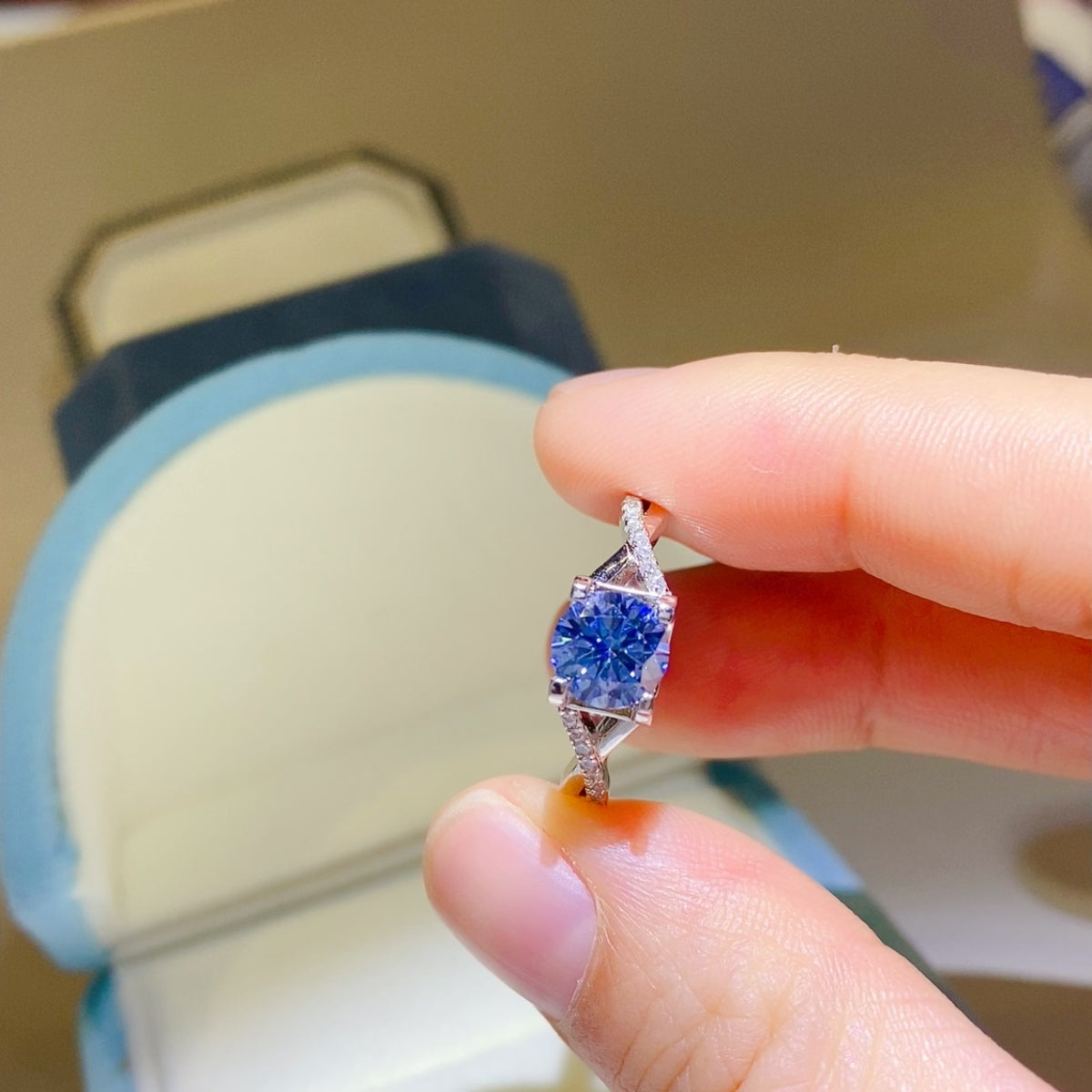 1 Carat Blue Brilliant Round Cut Sparkala™ Crisscross Pure Sterling Silver Ring