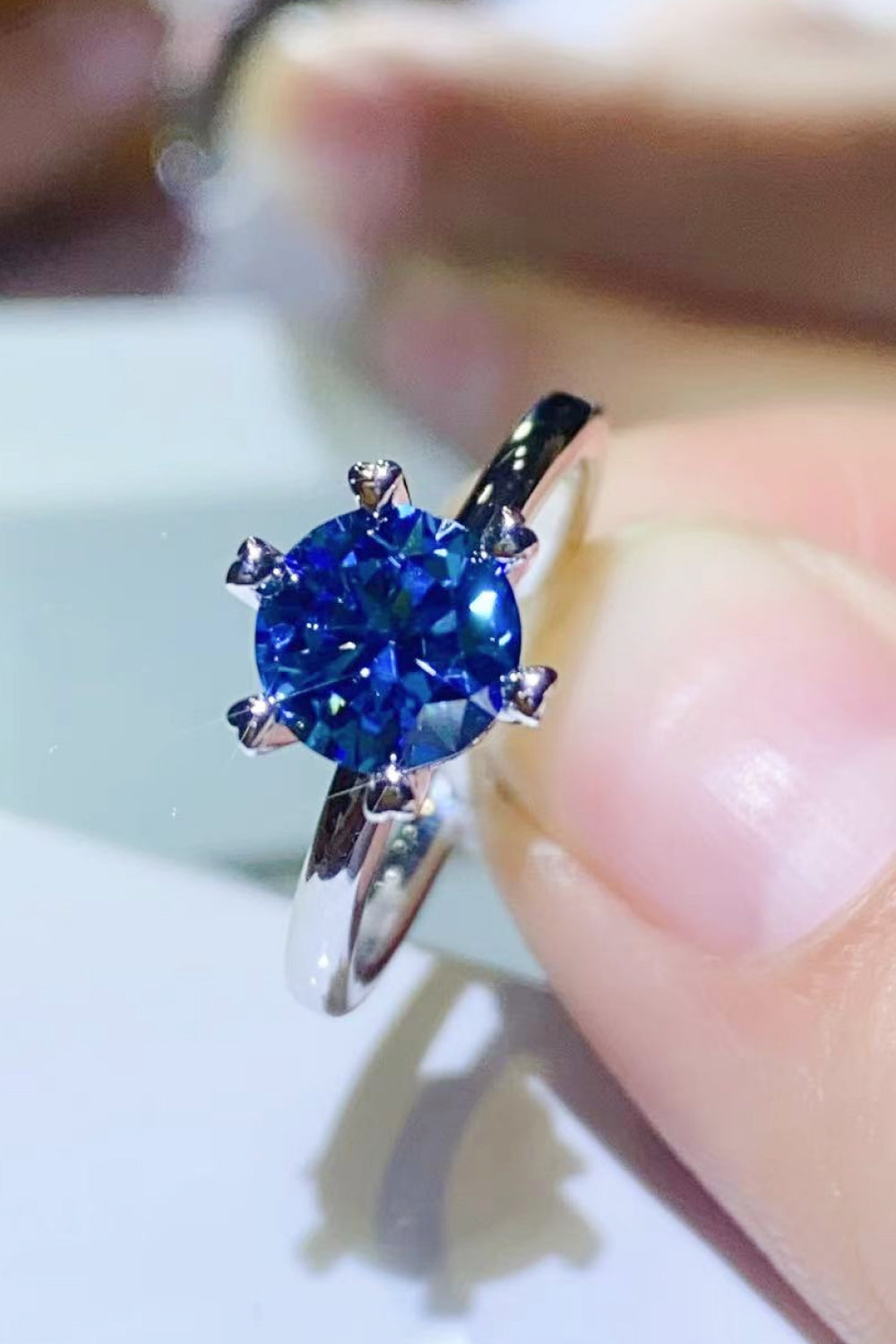 1 Carat Blue Brilliant Round Cut Sparkala™ 6-Prong Solitaire Ring (Platinum Over Pure Sterling Silver)